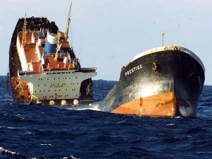 The Prestige sinking in the Atlantic after being refused access to sheltered waters off Spain in 2002